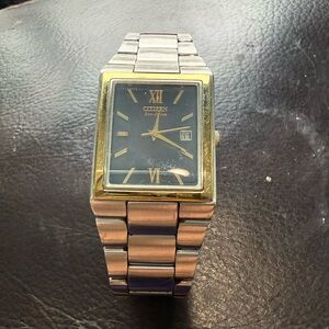 Citizen Eco-Drive Rectangular TankWatch Two Tone Gold Black Dial Date